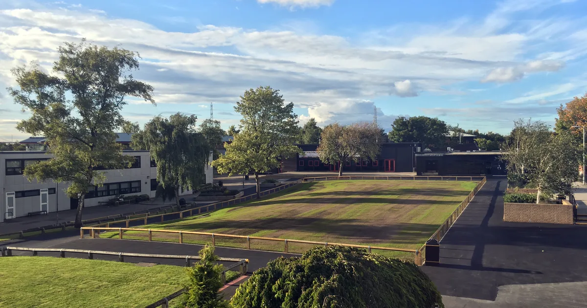 Outwood Grange Academy site, Wakefield, viewed across its grounds in autumn.