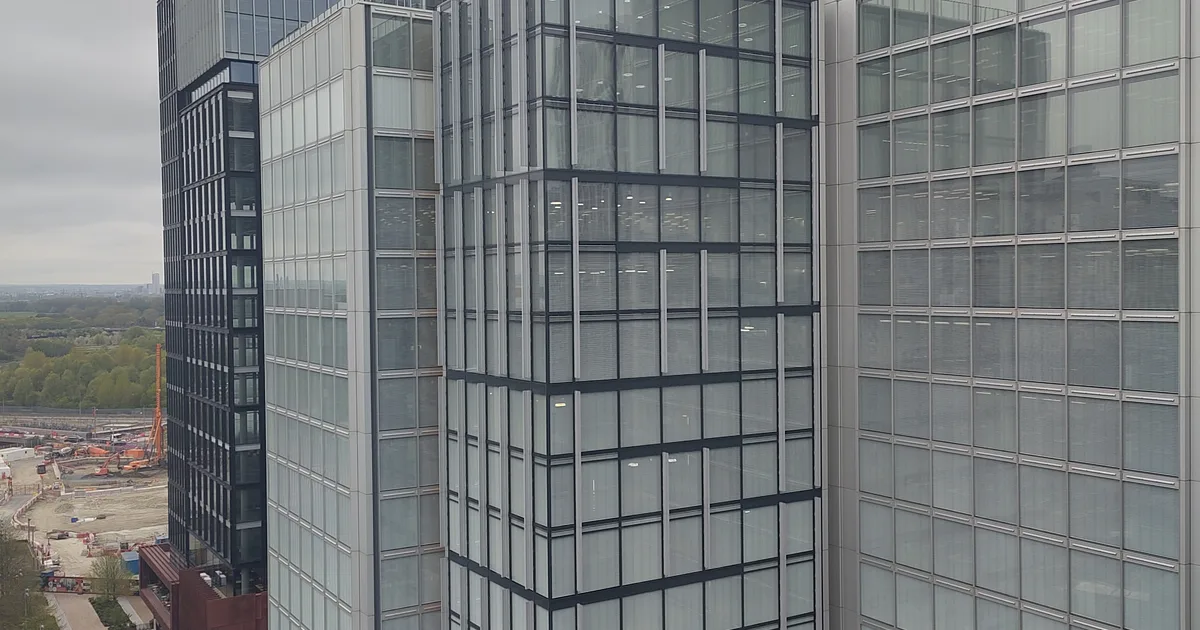 12 Endeavour Square, Stratford, the glass-fronted headquarters of the Financial Conduct Authority, photographed in April 2026.