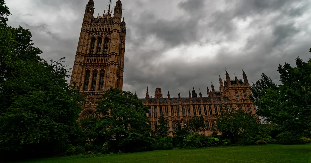 Victoria Tower, part of the Palace of Westminster, seen from within Victoria Tower Gardens, London.