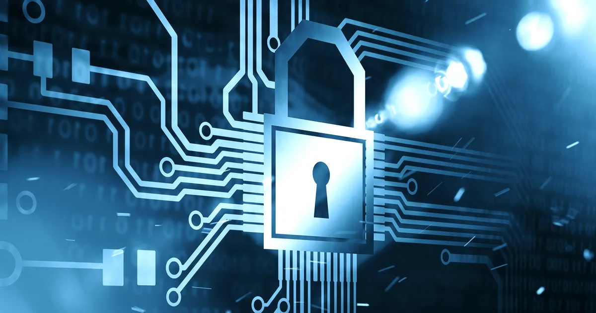 A metal padlock resting on a computer keyboard, symbolising online security.
