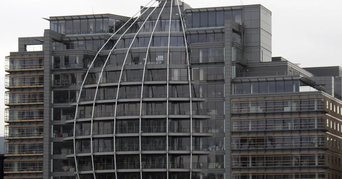 Riverside House, Bankside, London, the headquarters of Ofcom, its distinctive curved glass facade seen from across the Thames.
