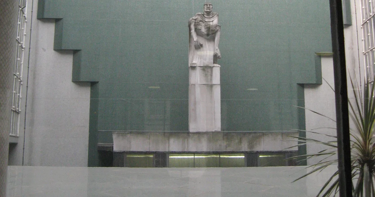 Jacob Epstein's Trade Unionist sculpture in the courtyard of TUC Congress House, London.